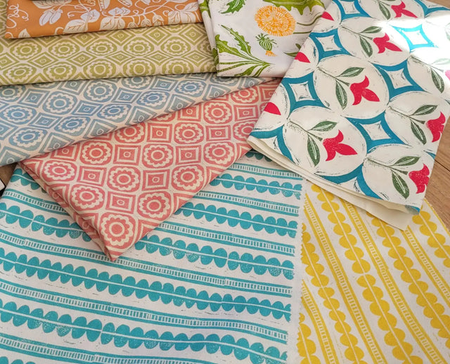 lino cut fabric designs by lizzie mabley