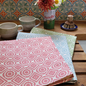 lino cut printed tea towels designed by lizzie mabley