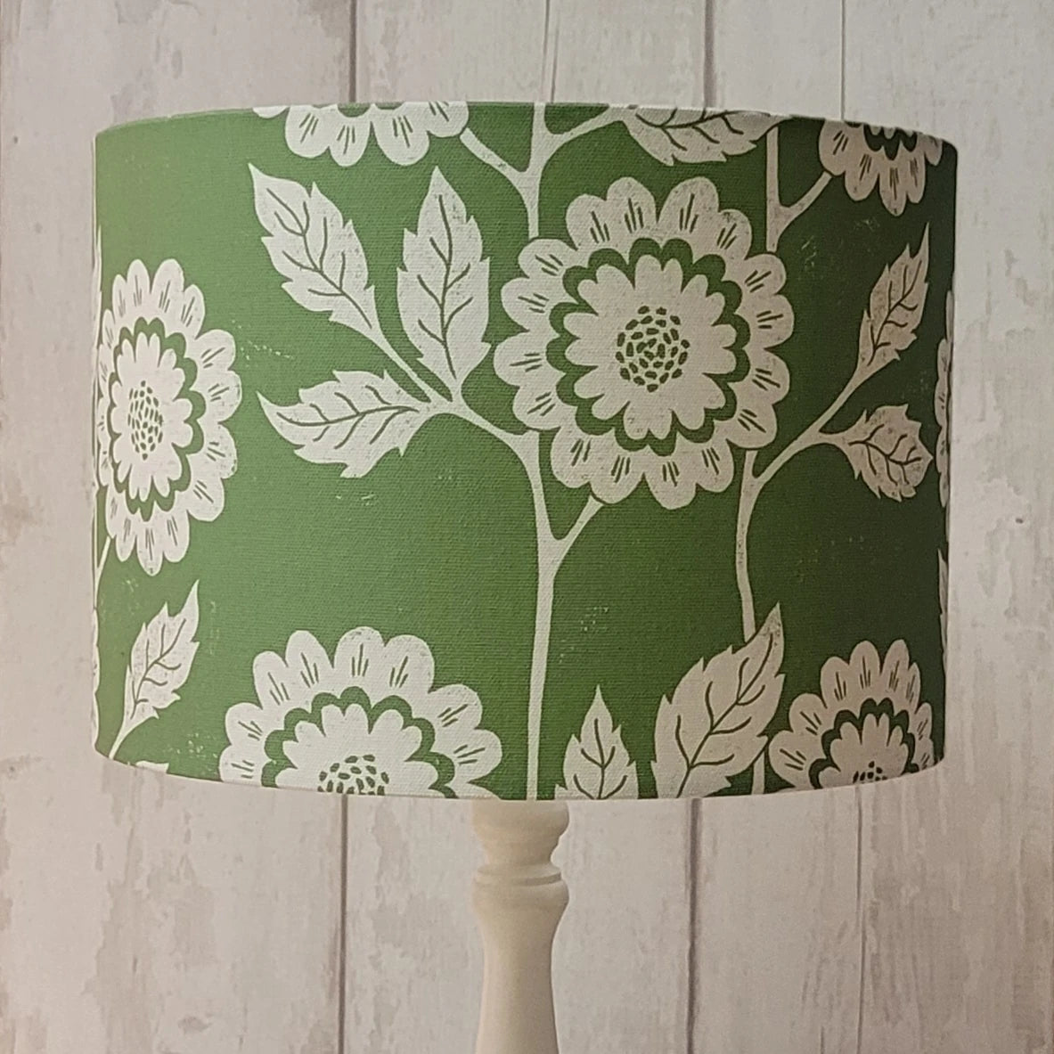 cecilia lino block printed fabric designed by lizzie mabley and made into a green lampshade