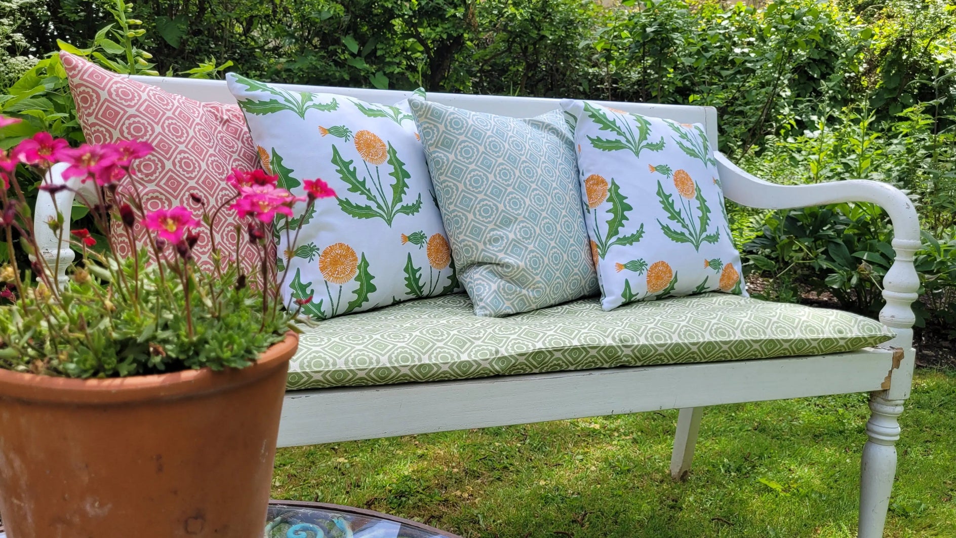 Rebecca and Dandelion lizzie mabley designed fabrics on garden bench