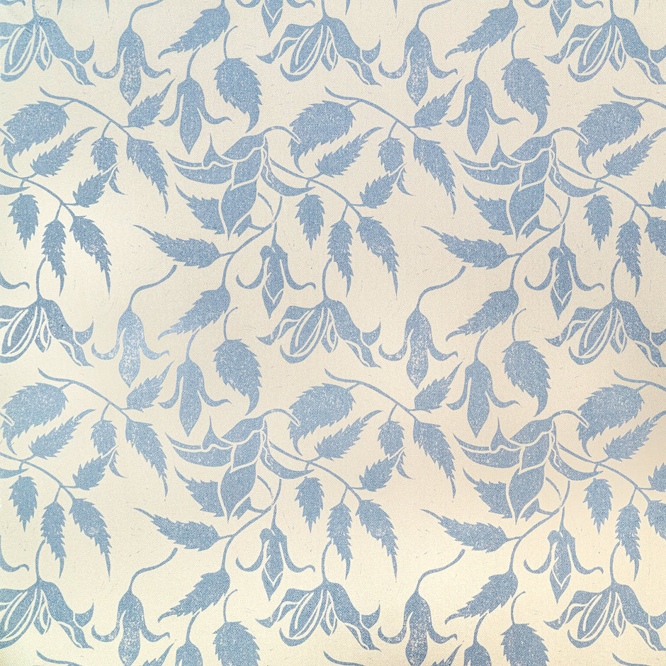 Blue on Cream Alpina lino block printed fabric designed by Lizzie Mabley
