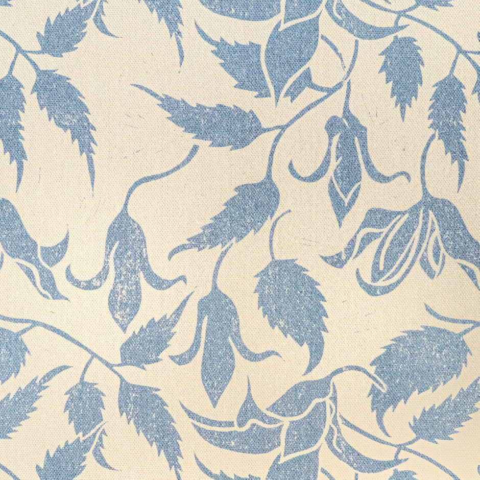 Blue on Cream Alpina lino block printed fabric designed by Lizzie Mabley