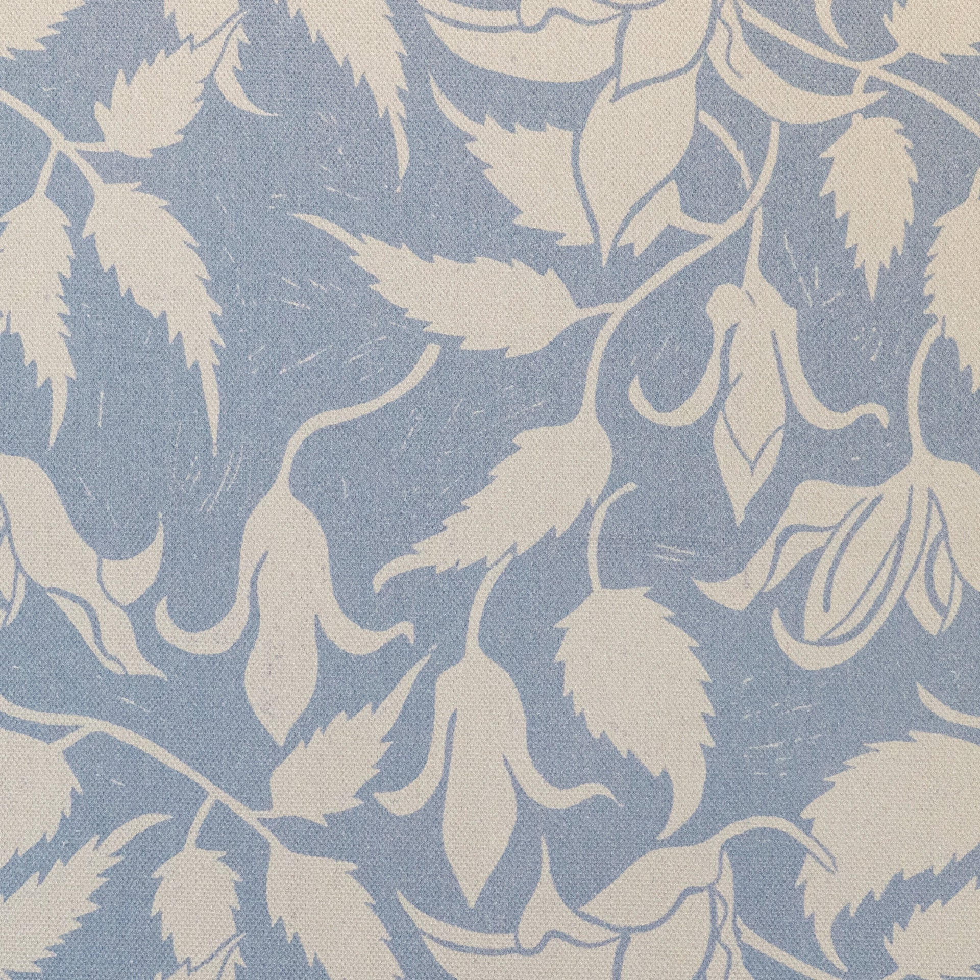 Cream on Blue Alpina lino block printed fabric designed by Lizzie Mabley