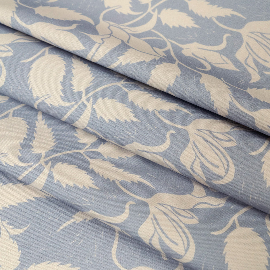 Cream on Blue Alpina lino block printed fabric designed by Lizzie Mabley