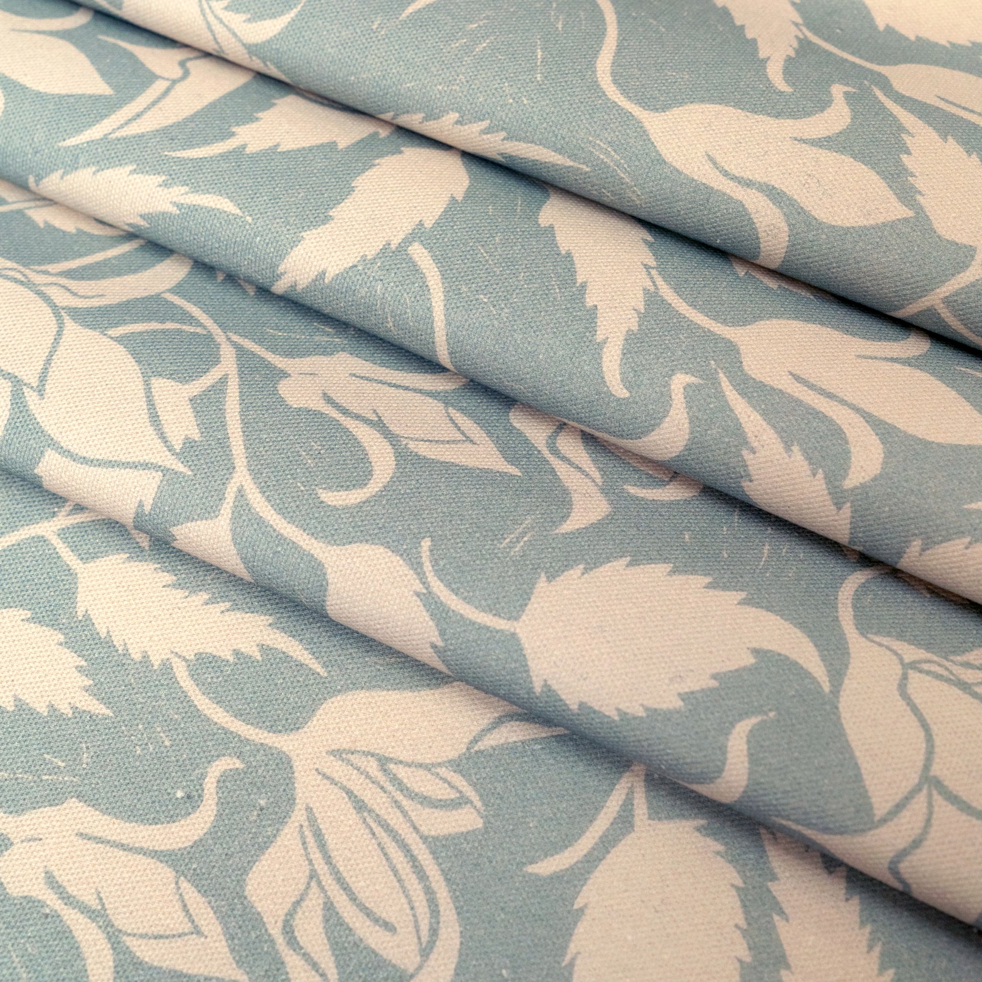 Green Alpina lino block printed fabric designed by Lizzie Mabley