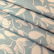 Green Alpina lino block printed fabric designed by Lizzie Mabley