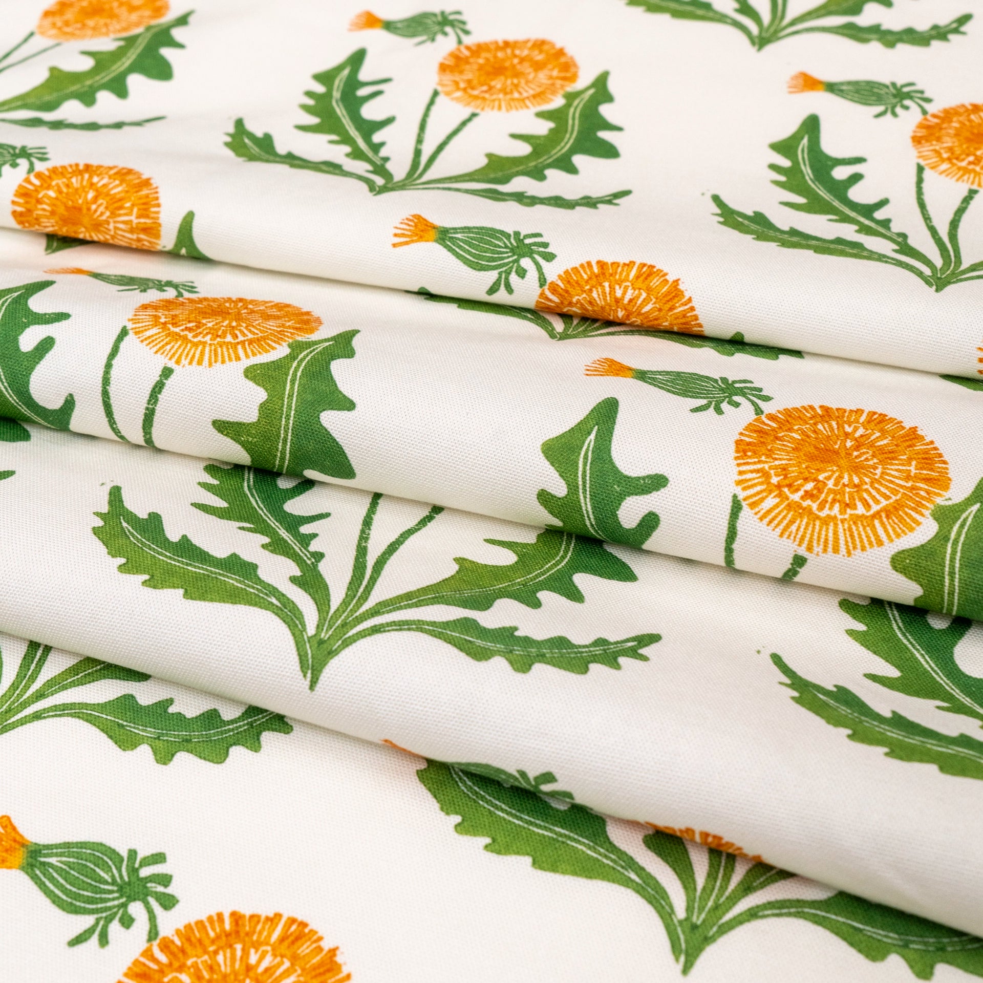 Dandelion lino block printed fabric designed by Lizzie Mabley