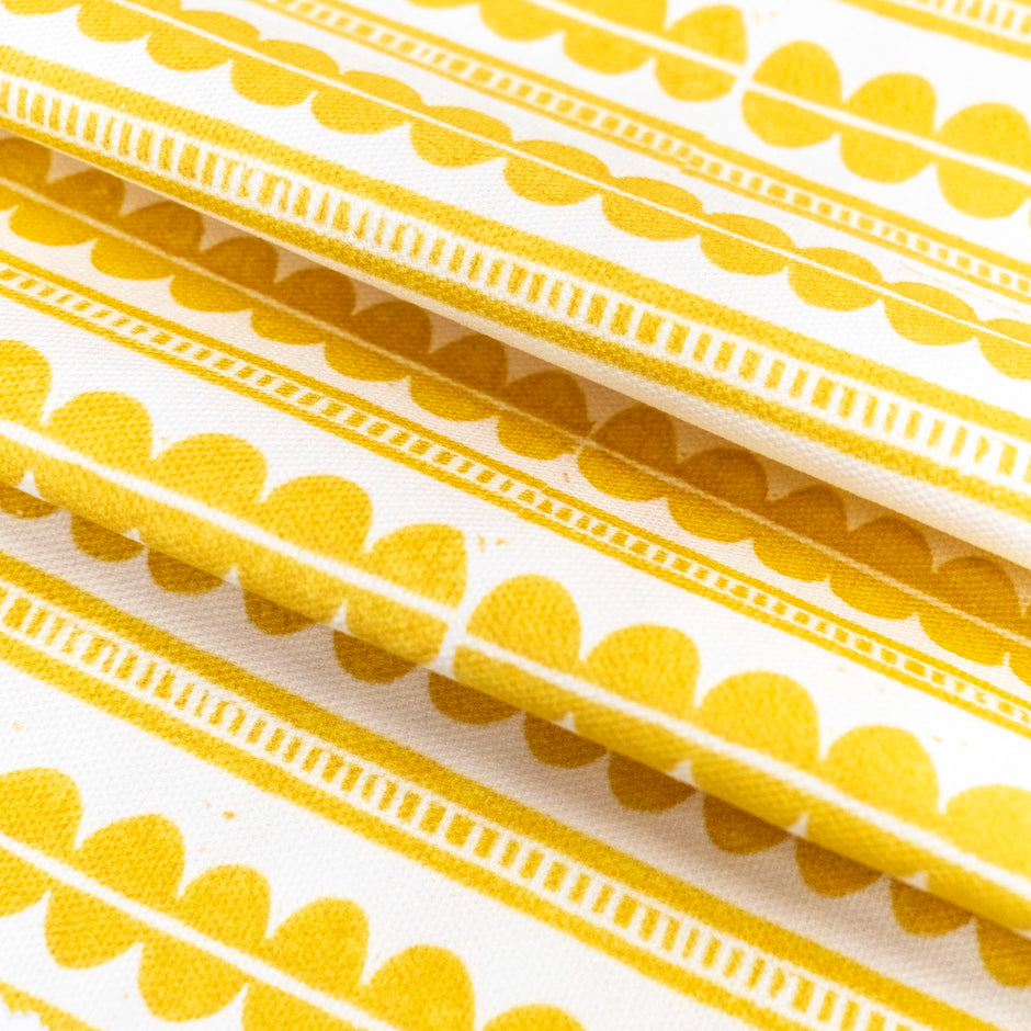 Yellow Henry lino block printed fabric designed by Lizzie Mabley