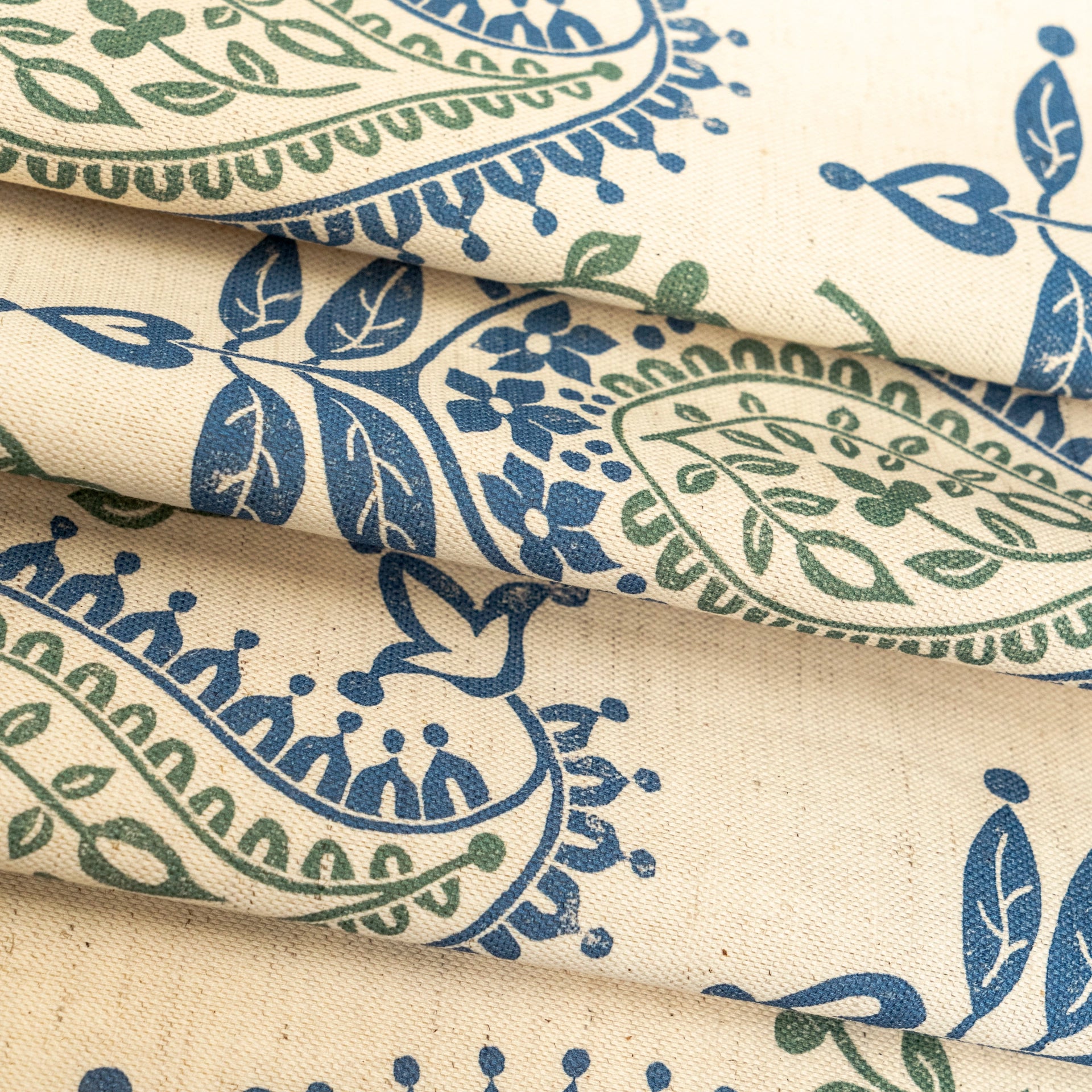 Blue and Green Josephine lino block printed fabric designed by Lizzie Mabley
