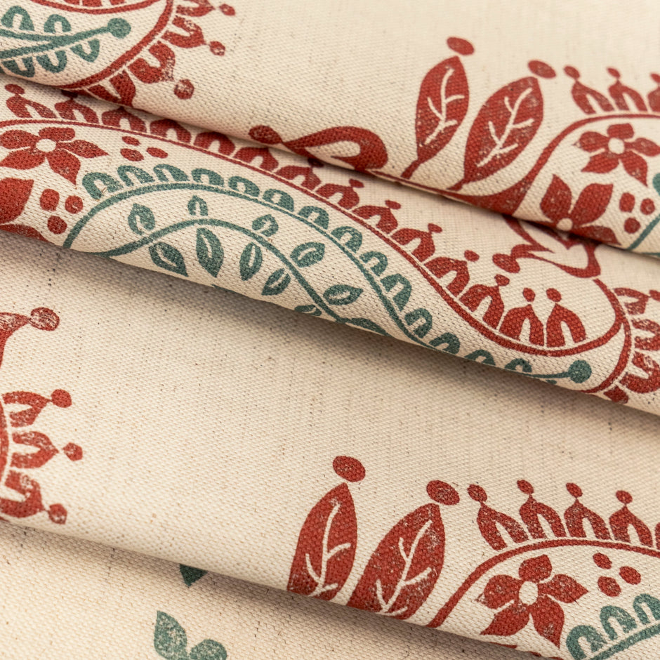 Red and Green Josephine lino block printed fabric designed by Lizzie Mabley