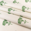 Green Marigold lino block printed fabric designed by Lizzie Mabley