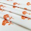 Orange Marigold lino block printed fabric designed by Lizzie Mabley