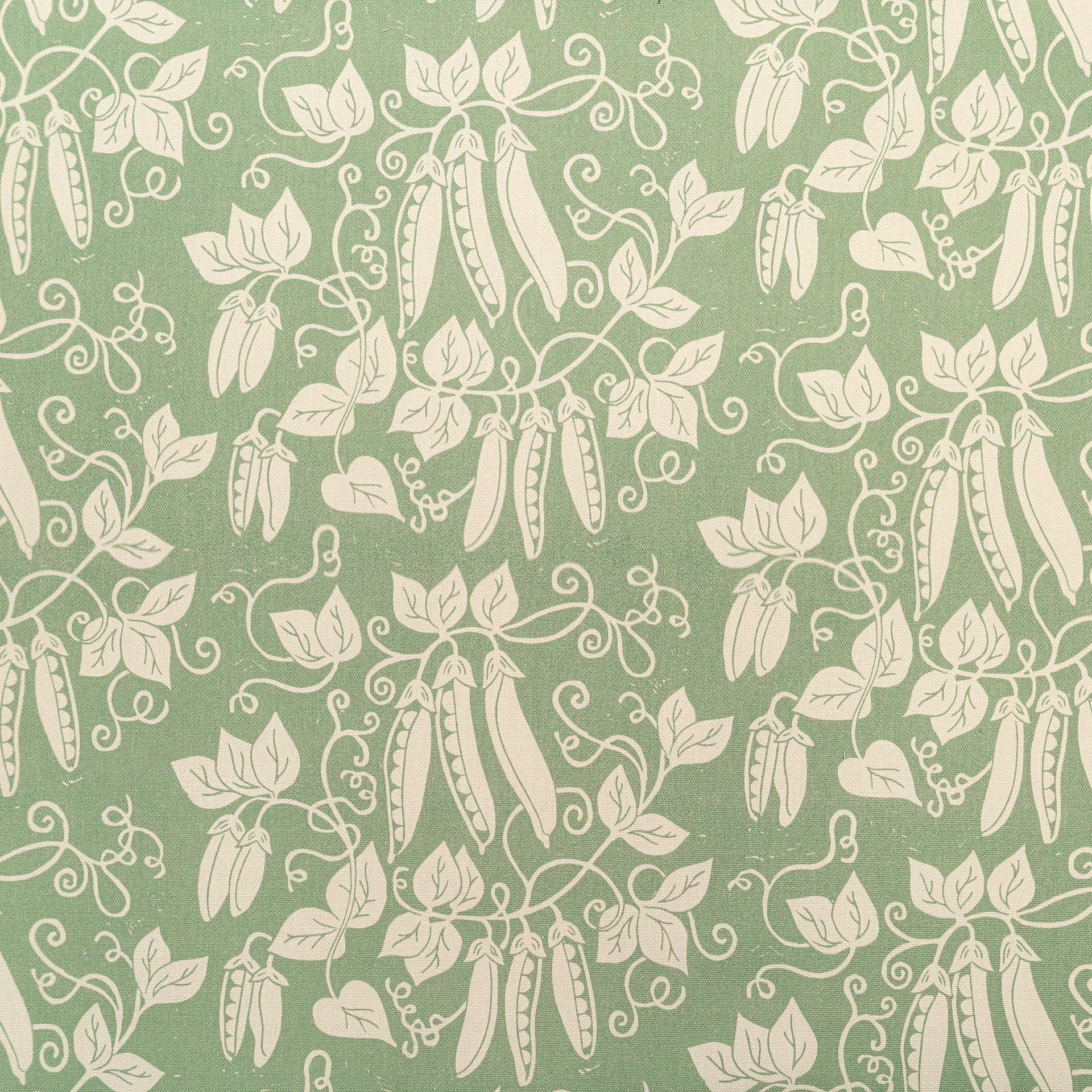Green Peas lino block printed fabric designed by Lizzie Mabley