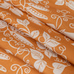 Pumpkin Orange Peas lino block printed fabric designed by Lizzie Mabley