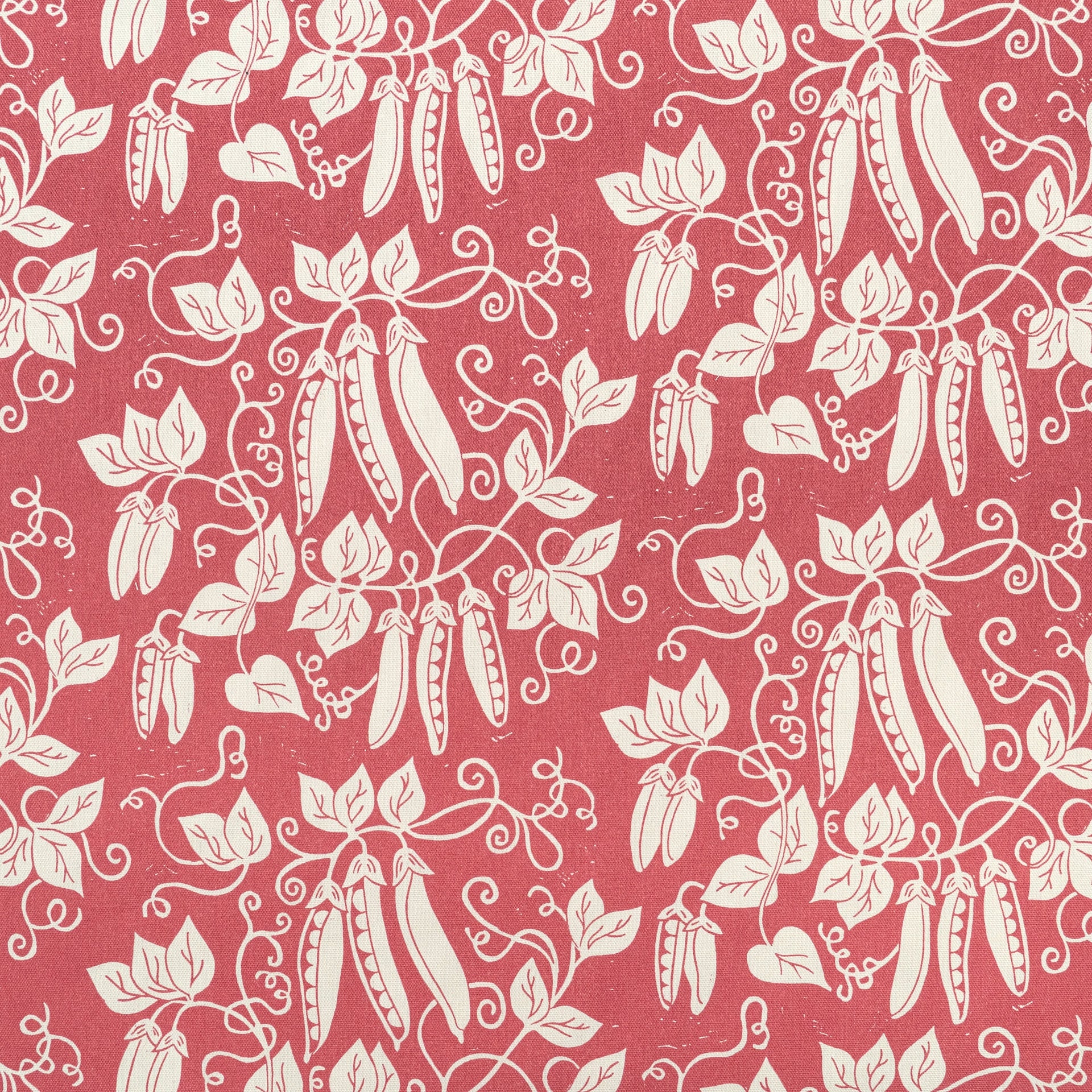 Raspberry Red Peas lino block printed fabric designed by Lizzie Mabley