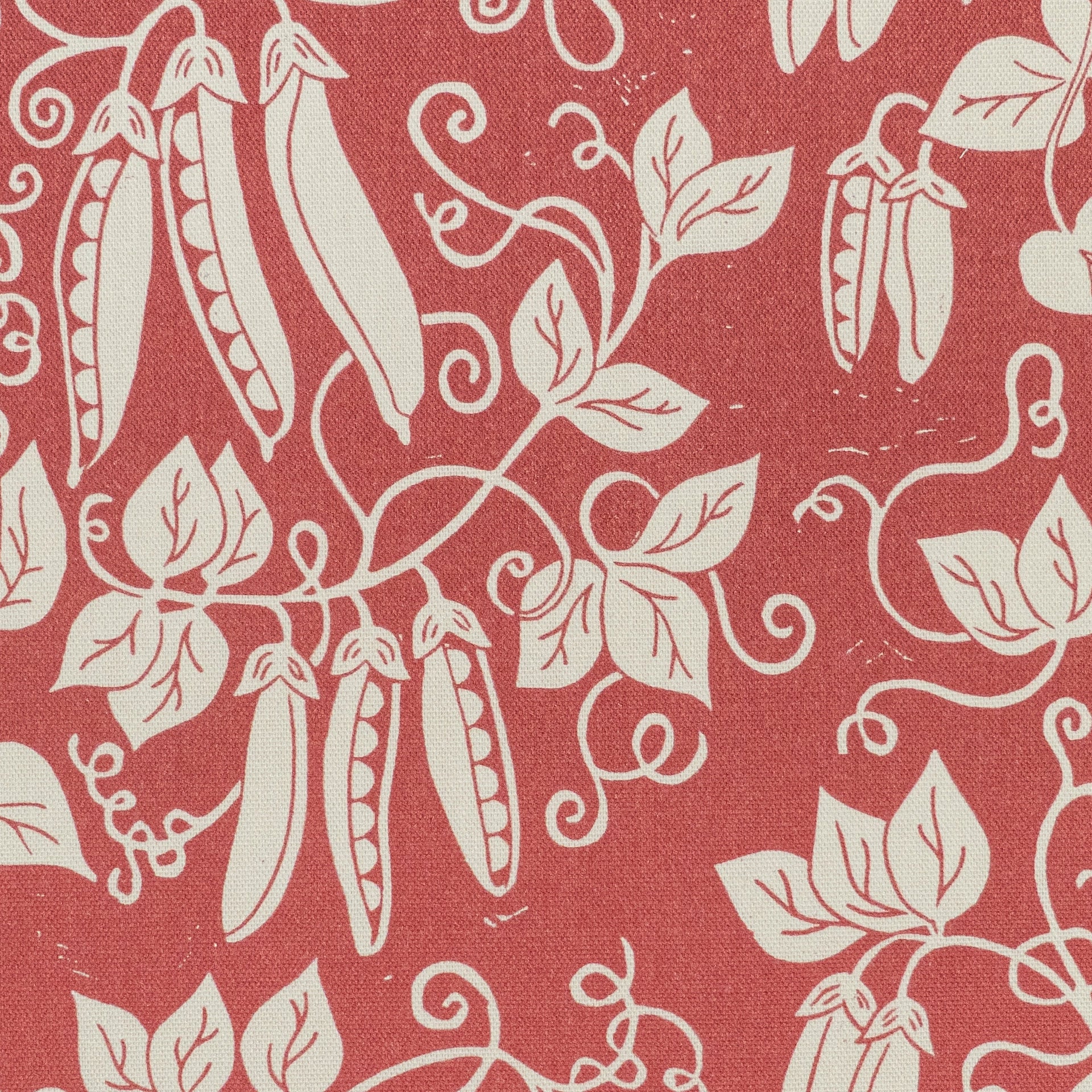Raspberry Red Peas lino block printed fabric designed by Lizzie Mabley