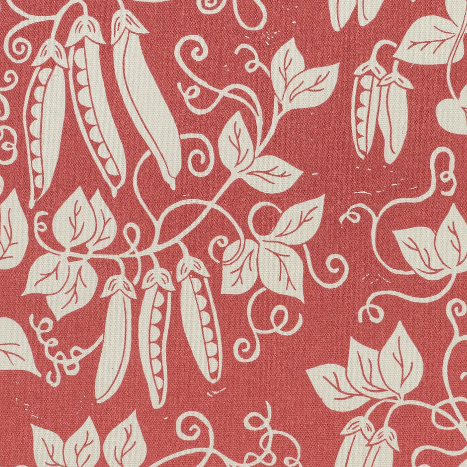 Raspberry Red Peas lino block printed fabric designed by Lizzie Mabley