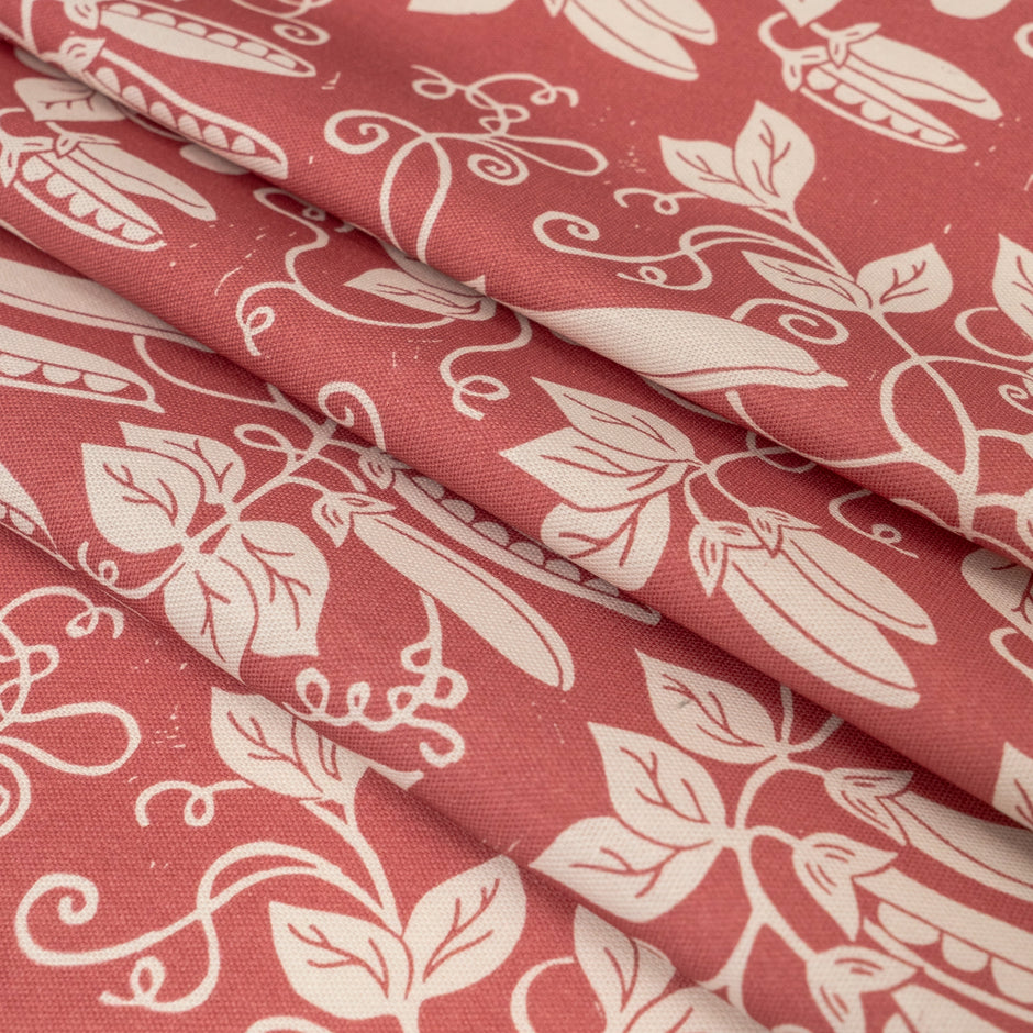 Raspberry Red Peas lino block printed fabric designed by Lizzie Mabley
