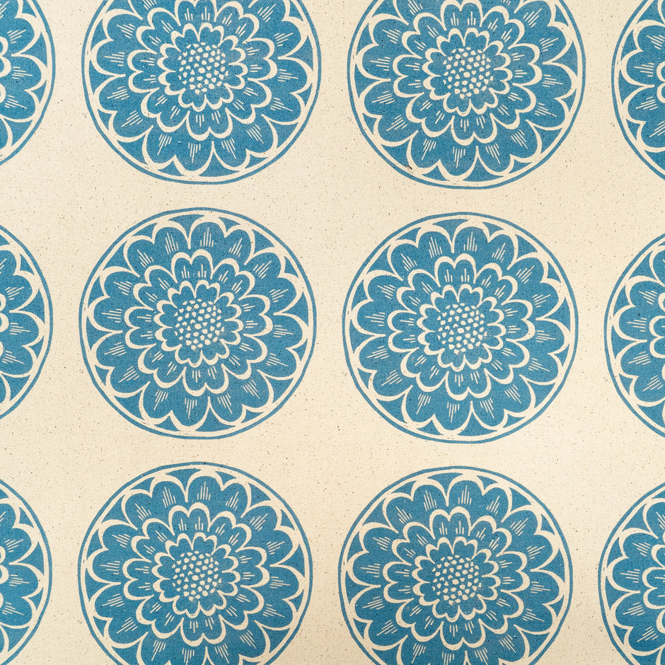 Blue Rosette lino block printed fabric designed by Lizzie Mabley