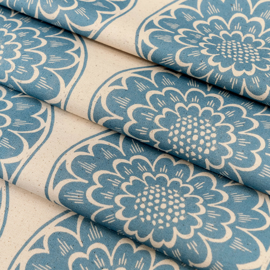 Blue Rosette lino block printed fabric designed by Lizzie Mabley