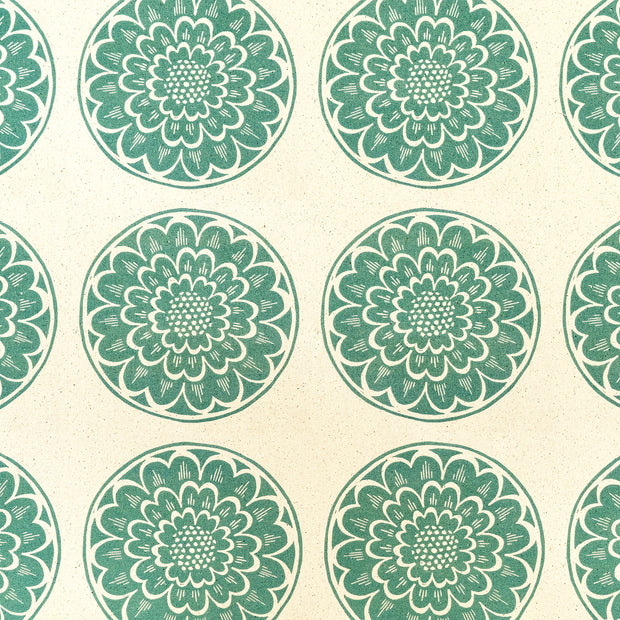 Green Rosette lino block printed fabric designed by Lizzie Mabley