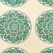 Green Rosette lino block printed fabric designed by Lizzie Mabley