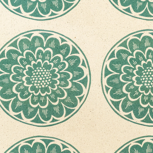 Green Rosette lino block printed fabric designed by Lizzie Mabley
