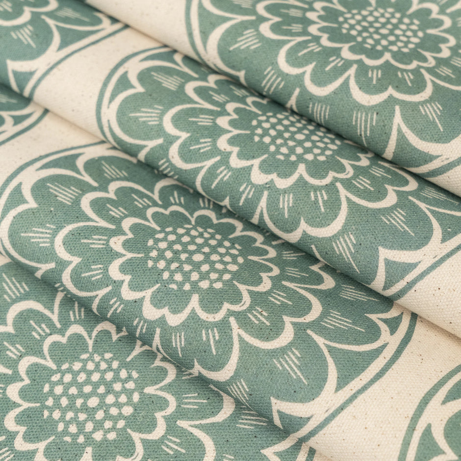 Green Rosette lino block printed fabric designed by Lizzie Mabley