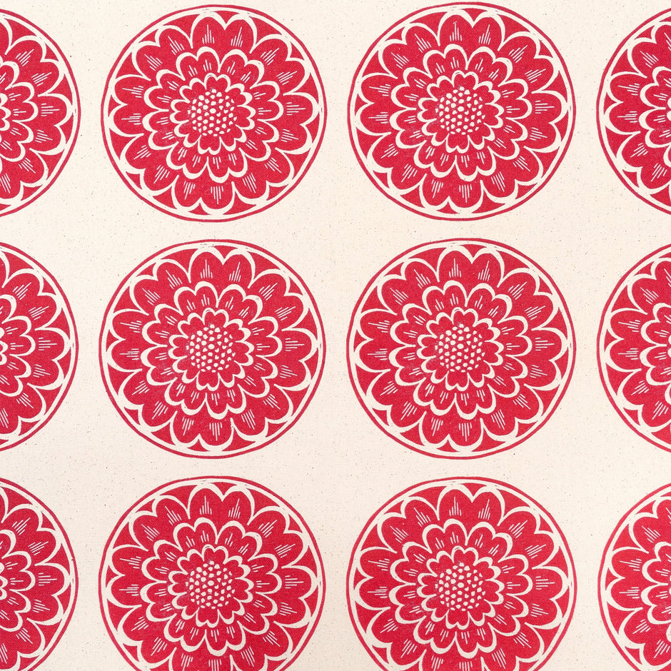 Red Rosette lino block printed fabric designed by Lizzie Mabley
