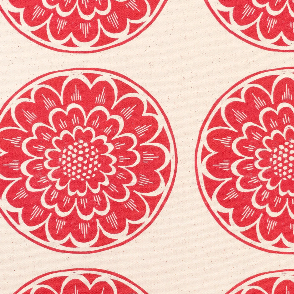 Red Rosette lino block printed fabric designed by Lizzie Mabley