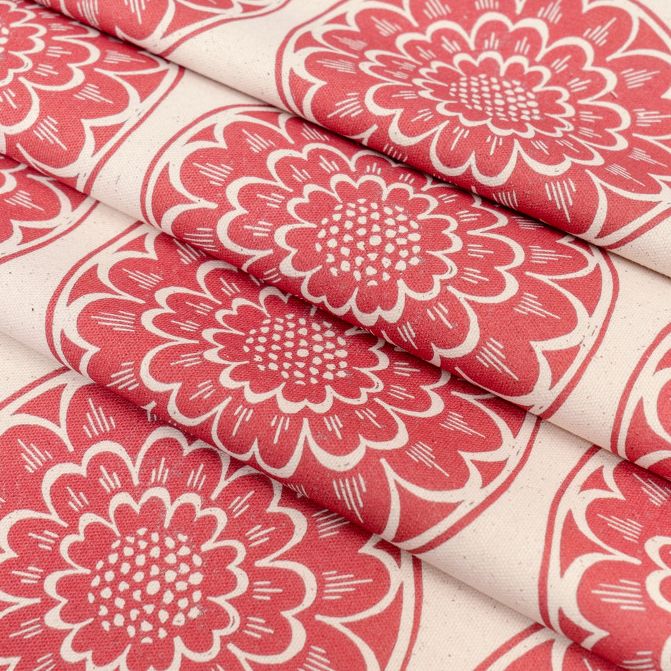 Red Rosette lino block printed fabric designed by Lizzie Mabley