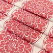 Red Rosette lino block printed fabric designed by Lizzie Mabley