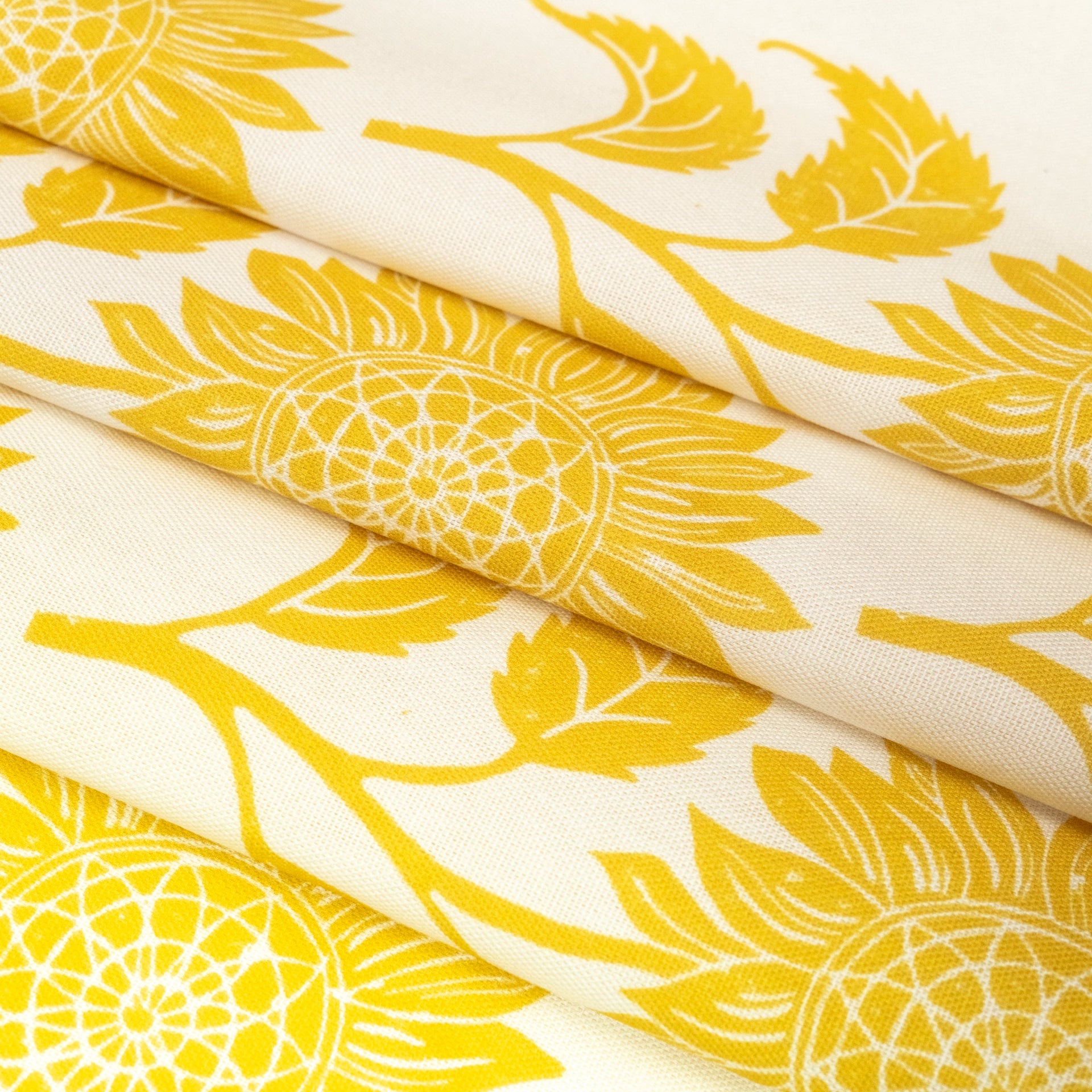 Sunflower lino block printed fabric designed by Lizzie Mabley