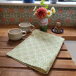 Pea Green Rebecca lino block printed fabric tea towel designed by Lizzie Mabley