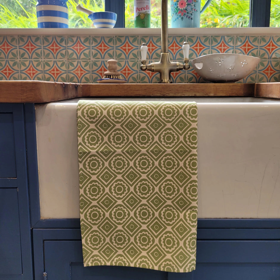Pea Green Rebecca lino block printed fabric tea towel designed by Lizzie Mabley