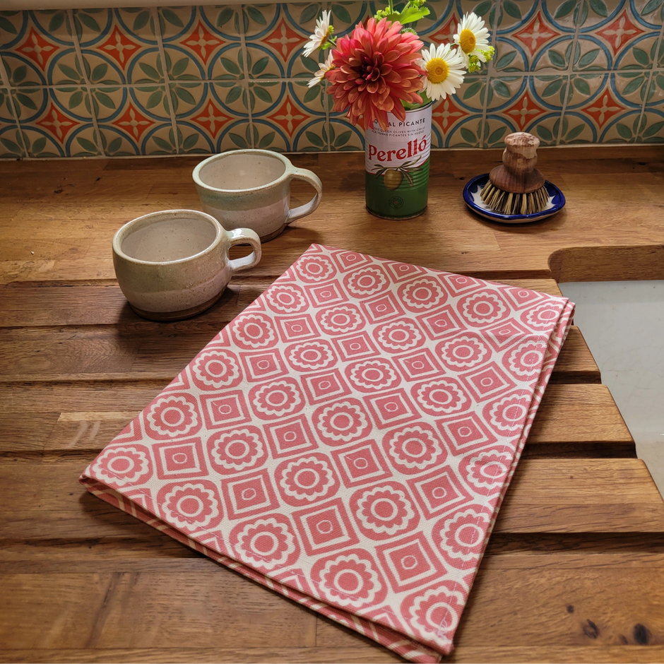 Candy Pink Rebecca lino block printed fabric tea towel designed by Lizzie Mabley