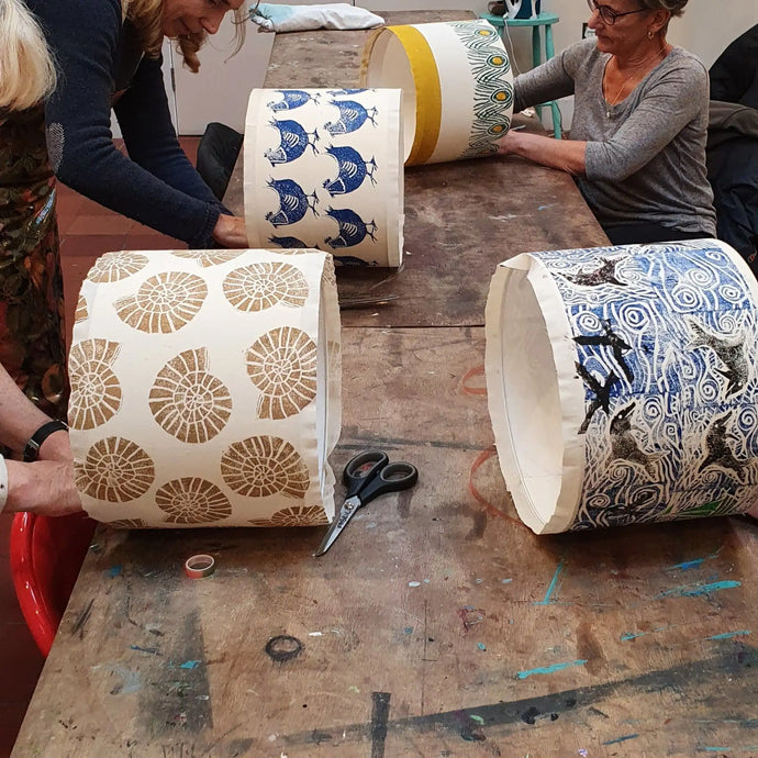 Lizzie mabley teaches a lampshade making workshop in her studio