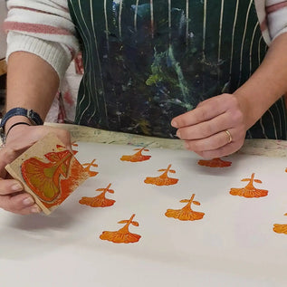 Lizzie mabley teaching a lino block printing workshop in her studio