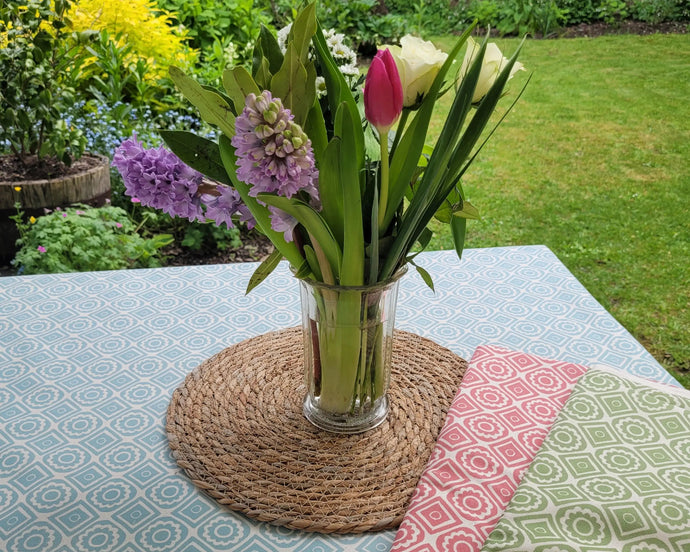 rebecca fabric designed by lizzie mabley set on an outdoor table in the garden