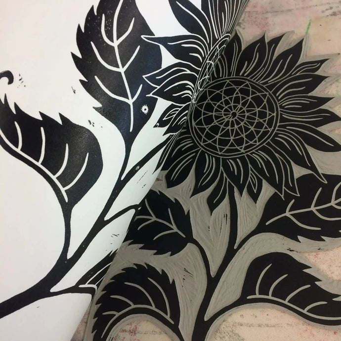 lino block printing of sunflower designed by lizzie mabley
