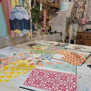 Lizzie mabley teaching a lino block printing workshop in her studio