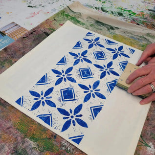 Lizzie mabley teaching a lino block printing workshop in her studio